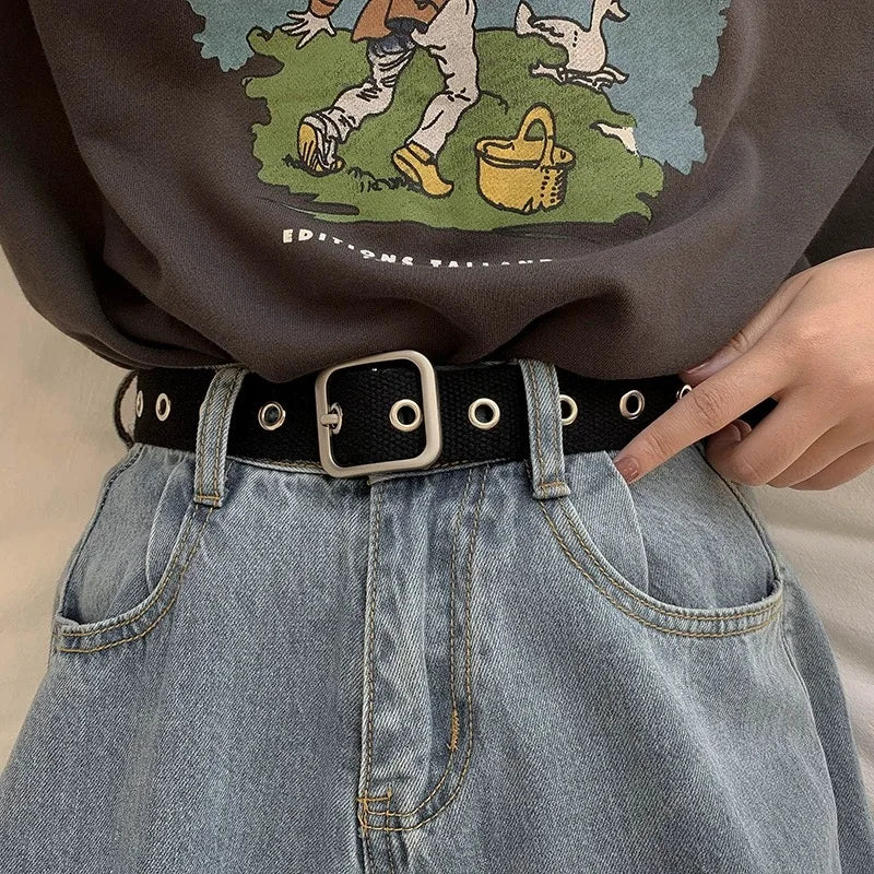 Perforated black canvas belt