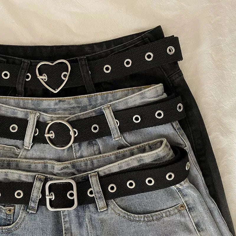 Perforated black canvas belt