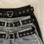 Perforated black canvas belt