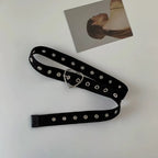 Perforated black canvas belt