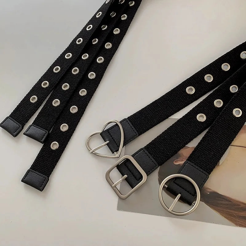 Perforated black canvas belt